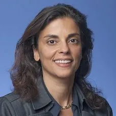 a woman with long hair smiling