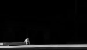 a man sitting on a bench