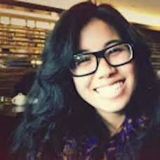 a woman smiling at the camera