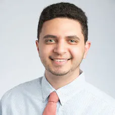 a man smiling for a picture