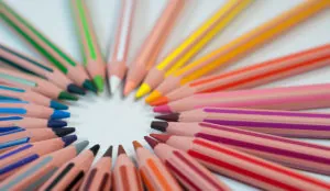 a group of colored pencils arranged in a circle