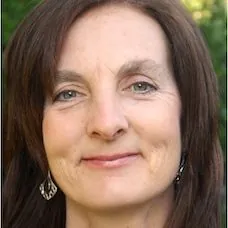 a close-up of a woman smiling