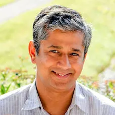 a man smiling for the camera