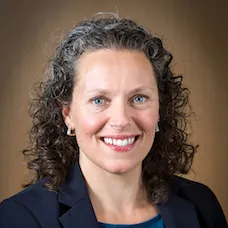 a close-up of a woman smiling