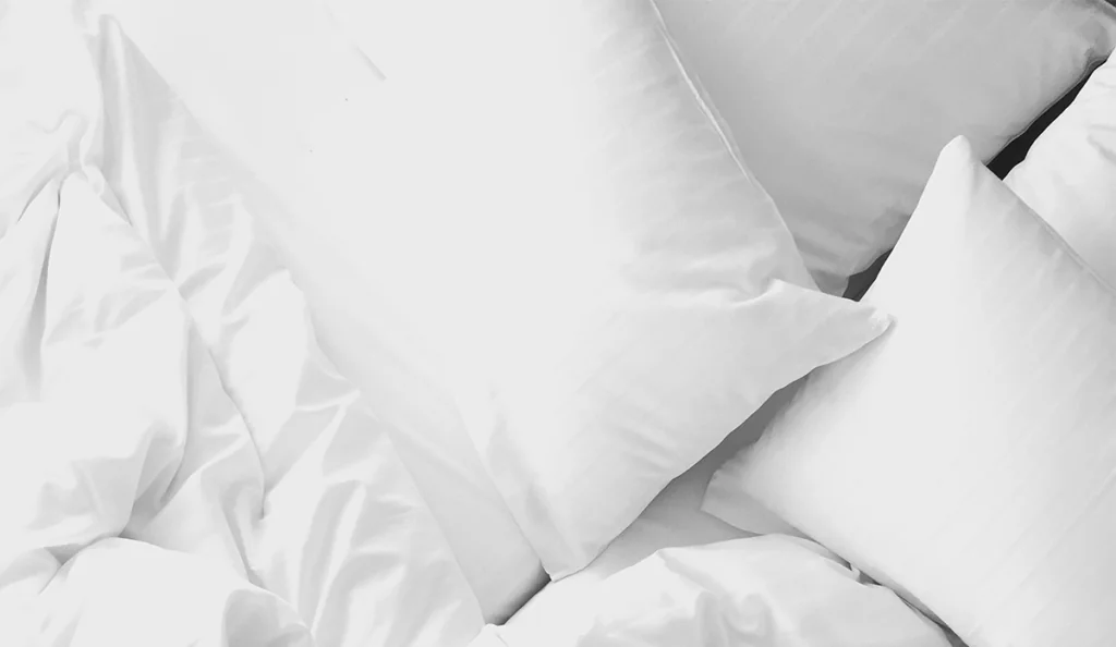 a white pillow and a white pillow