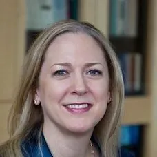 a close-up of a woman smiling
