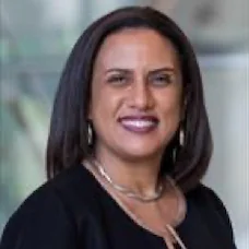 a woman smiling at the camera