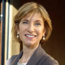 a woman smiling at the camera
