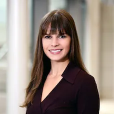 a woman smiling at camera