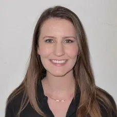 a woman smiling at the camera