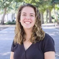 a woman smiling at camera