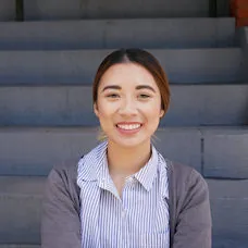 a woman smiling at camera