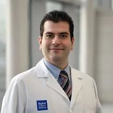 a man in a white lab coat