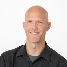 a man smiling for a picture