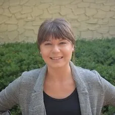 a woman smiling at camera