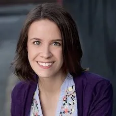 a woman smiling at the camera