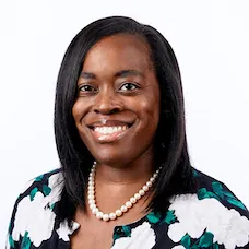 a woman smiling for a picture