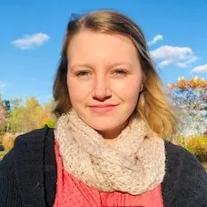 a woman smiling for a picture
