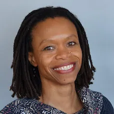 a woman smiling at the camera