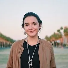 a woman smiling at camera