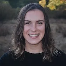 a woman smiling at camera