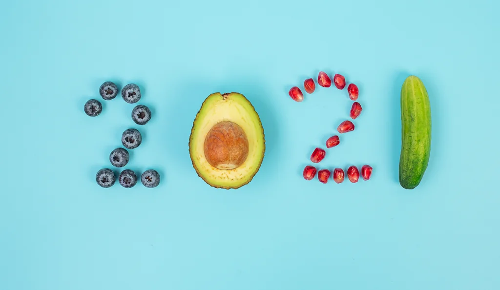 a number of fruits and berries arranged in the shape of numbers
