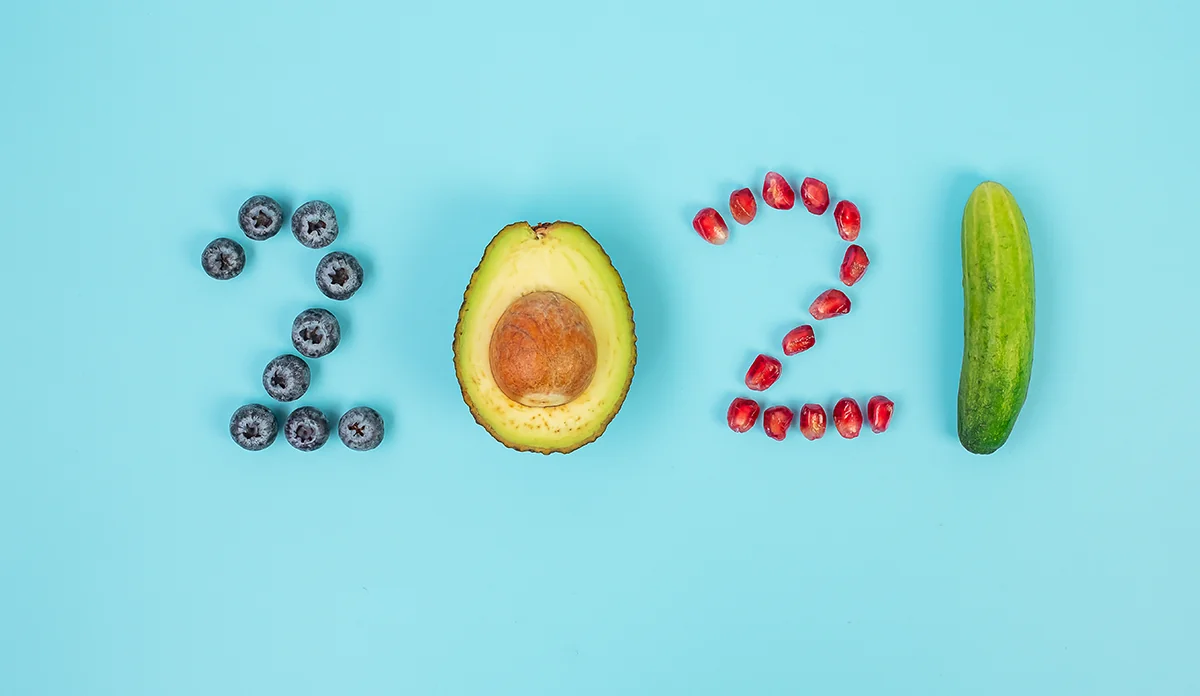 a number of fruits and berries arranged in the shape of numbers