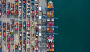 a container ship with many containers on the side