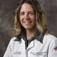 a woman in a white lab coat