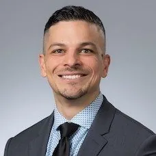 a man in a suit and tie