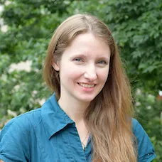 a woman smiling at camera