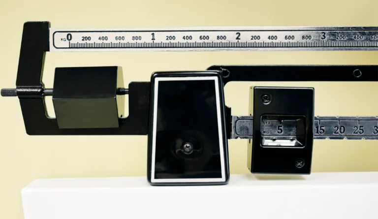 a black scale with a ruler