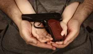 a person holding a gun