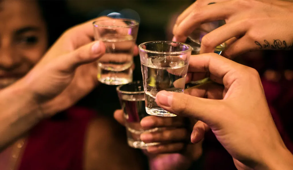 people having a shot together