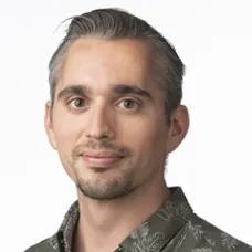 a man with grey hair and a beard