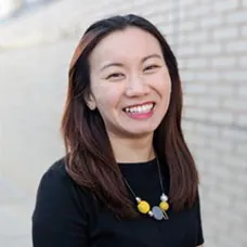 a woman smiling at camera