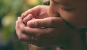 a person washing their hands