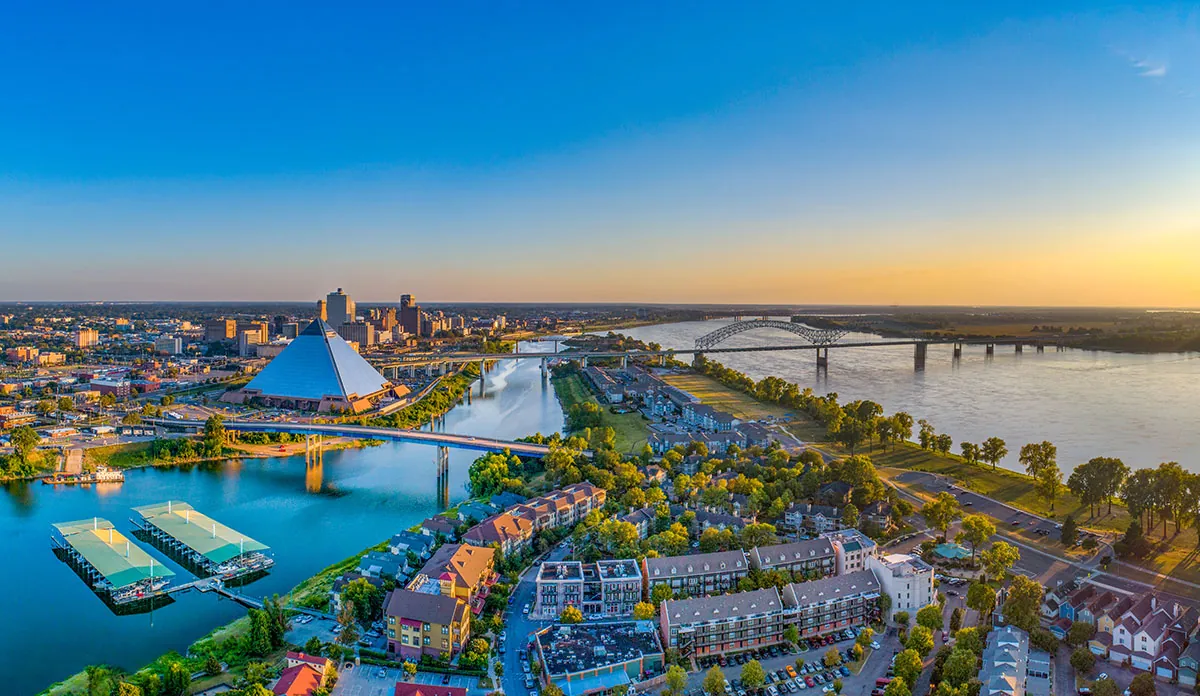a city with a bridge and a river