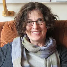 a woman smiling at camera
