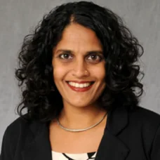 a close-up of a woman smiling