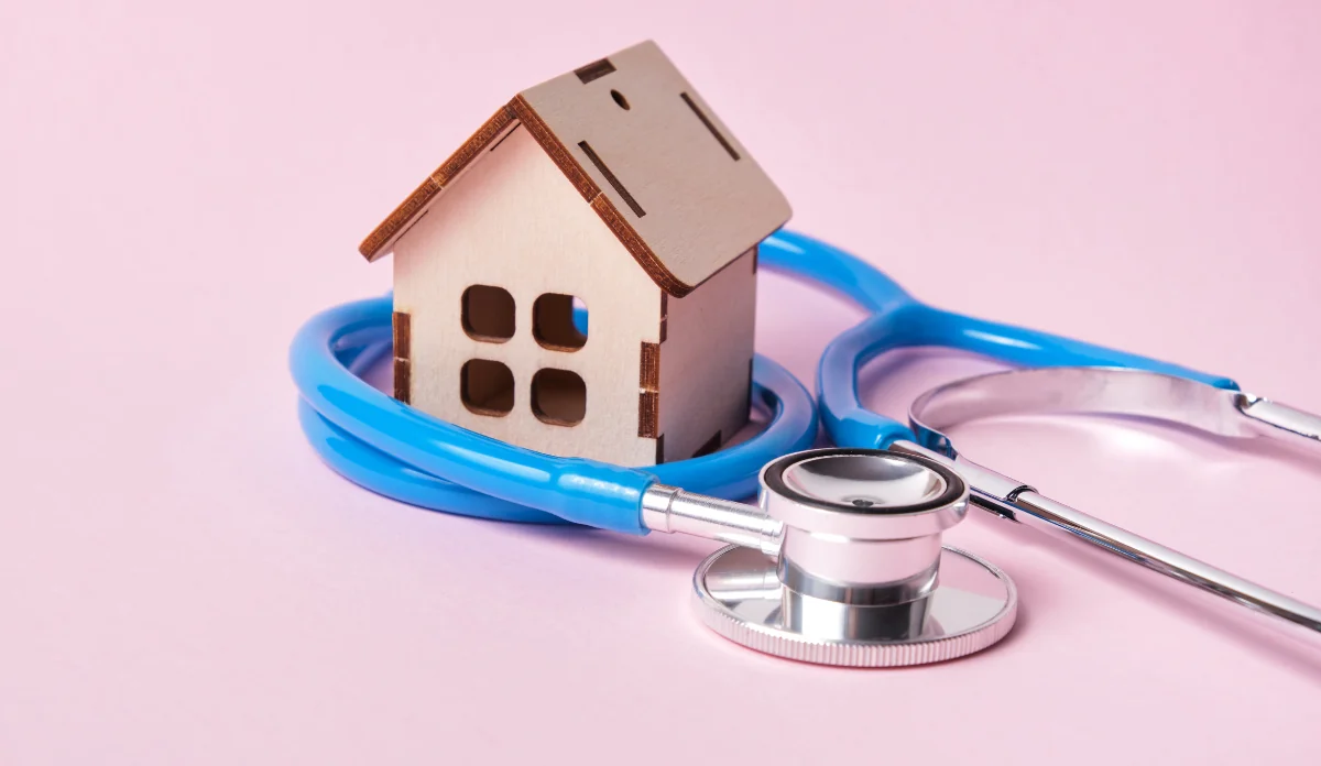 a small wooden house with a stethoscope
