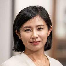 a woman with short black hair