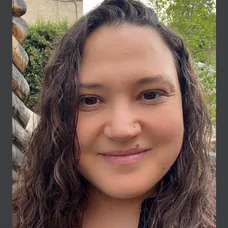 a woman smiling for a picture