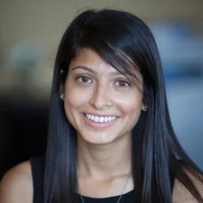 a close-up of a woman smiling