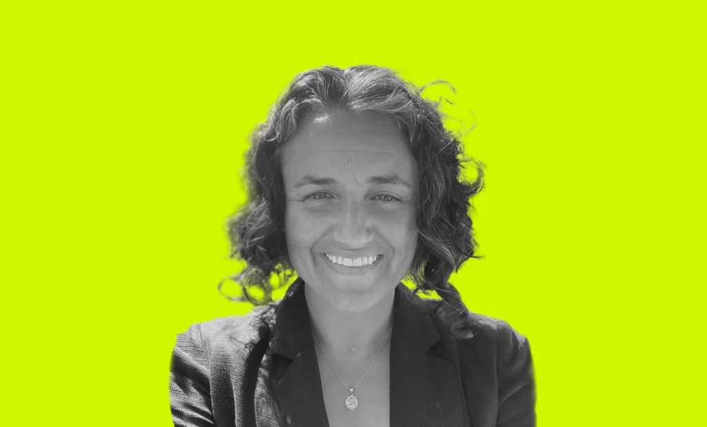 a woman smiling at camera