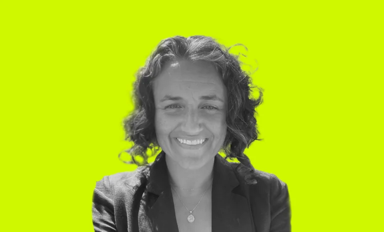 a woman smiling at camera