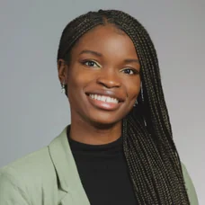 a woman smiling at the camera