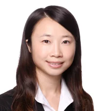 a woman with long hair smiling