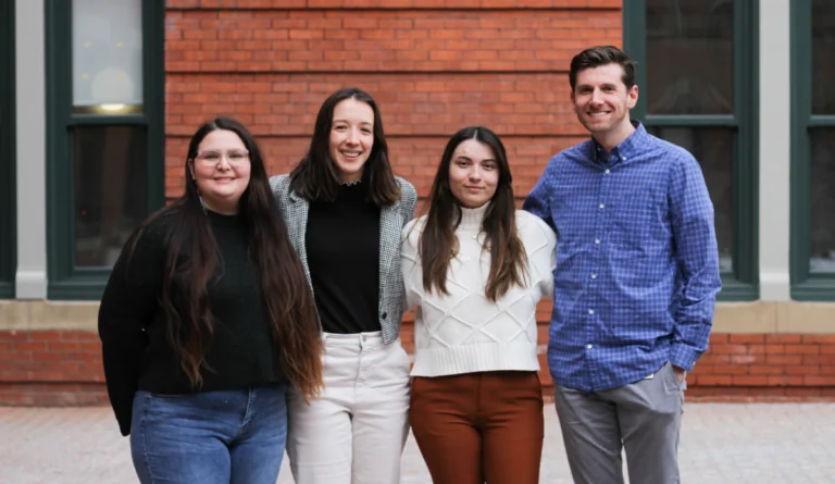a group of people posing for a photo