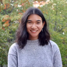 a woman smiling at camera